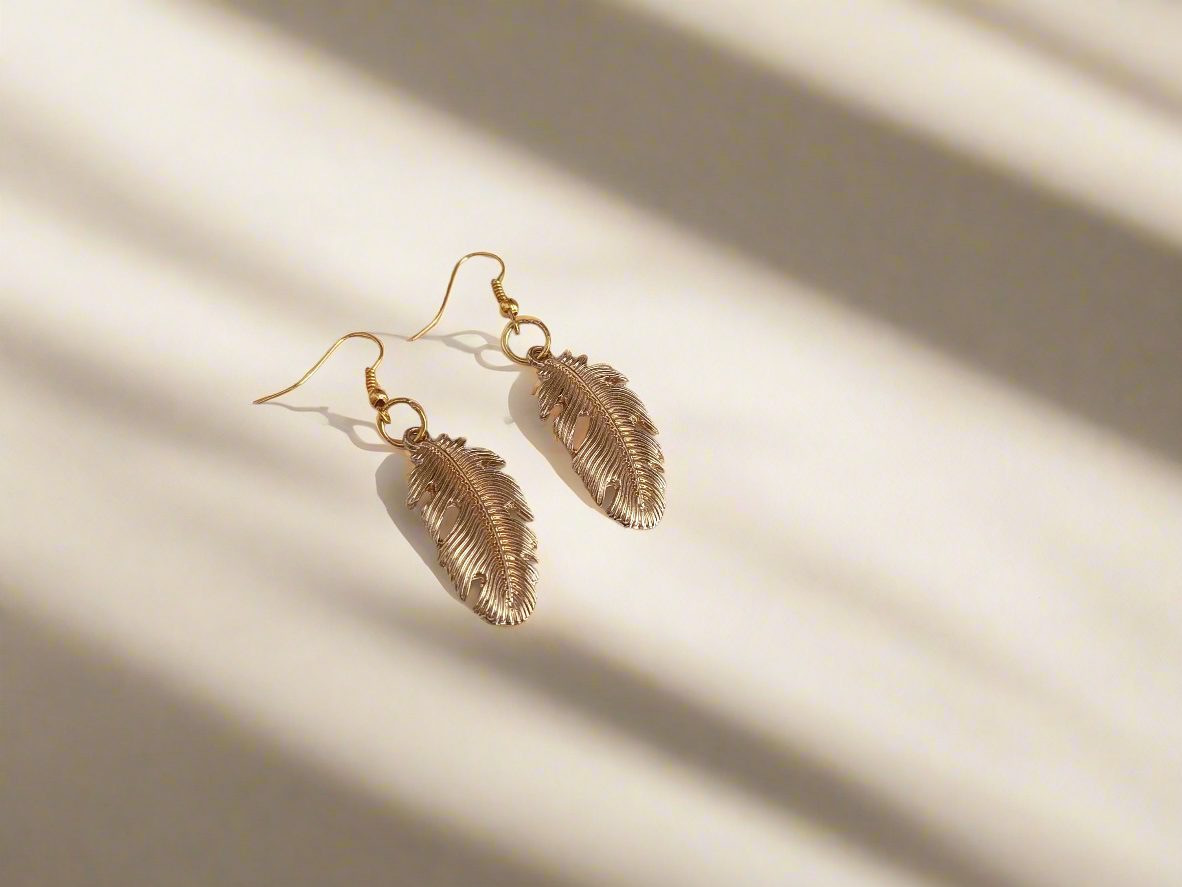 pendientes plumas