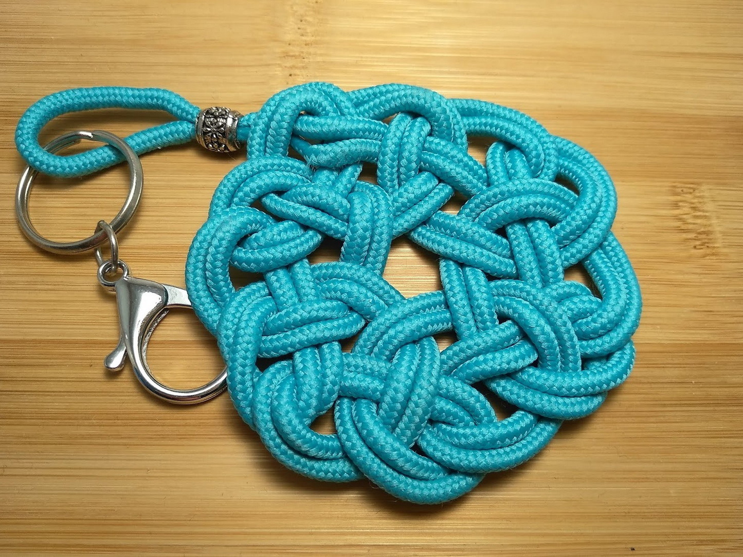 Leather and steel ratchet celtic symbol keychain