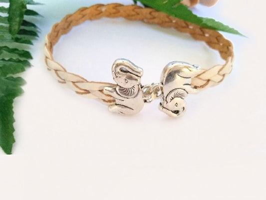 Pulsera de cuero blanco trenzado con elefante de la suerte