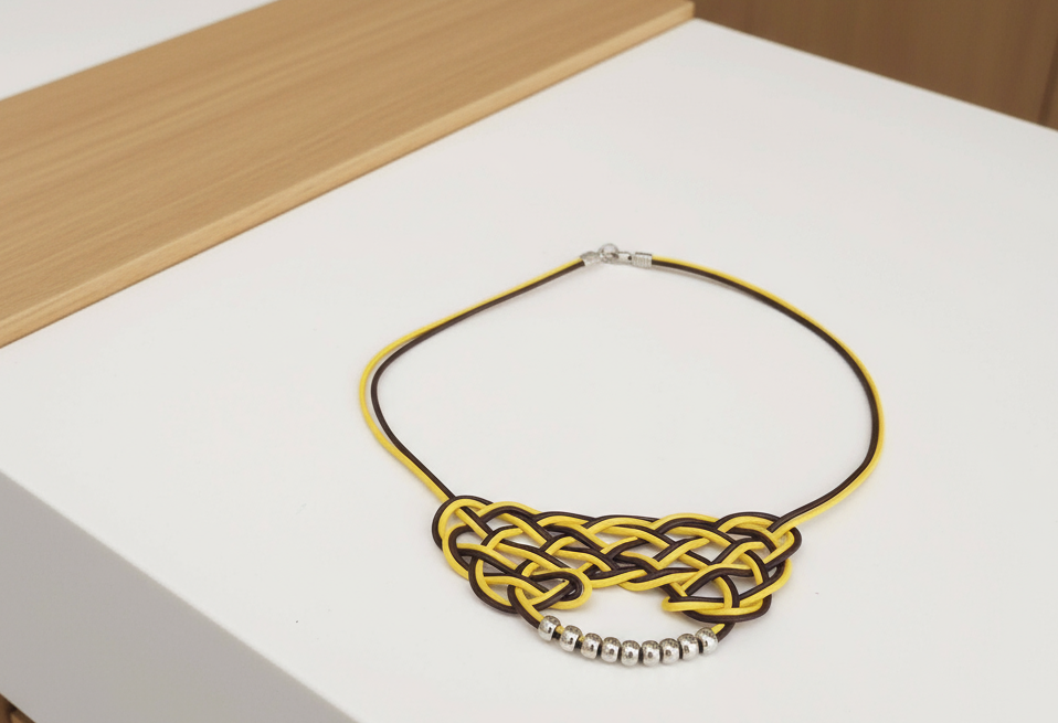 Mustard yellow and brown leather necklace with Celtic knot