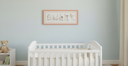 Graphic and pattern of the complete alphabet of 52 cross-stitch letters with designs for boys and girls