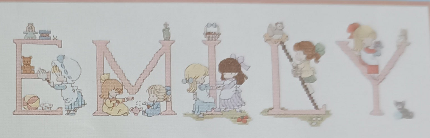 Graphic and pattern of the complete alphabet of 52 cross-stitch letters with designs for boys and girls