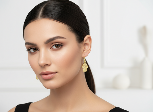 Pendientes dorados símbolo mano de Fátima