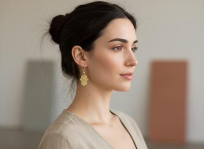 Golden earrings with Fatima's hand