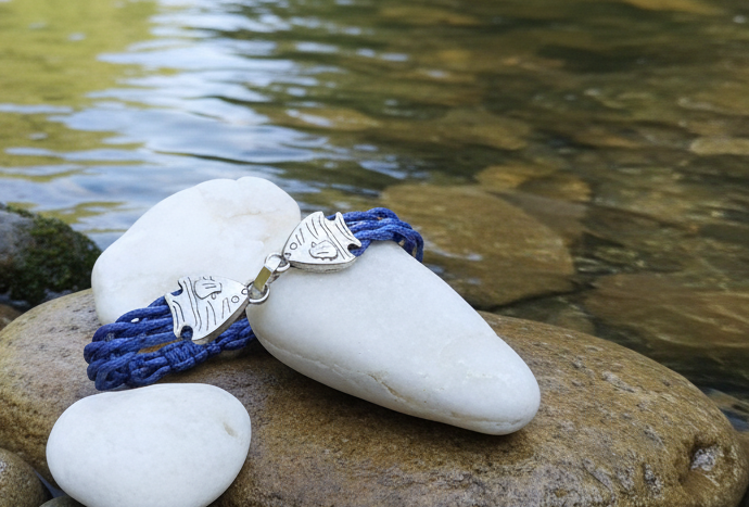 Braided sailor style bracelet in nautical blue with fish clasp