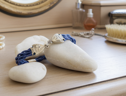 Braided sailor style bracelet in nautical blue with fish clasp