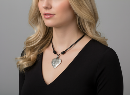 Short leather necklace with heart in boho style