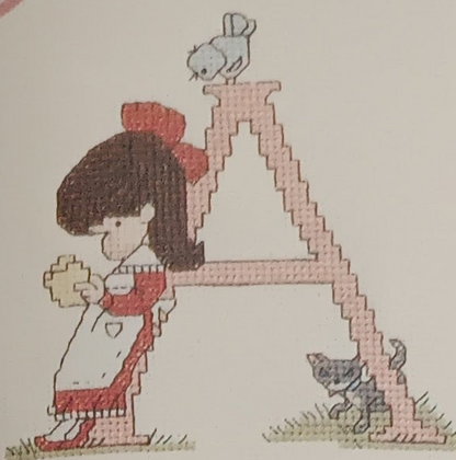 Graphic and pattern of the complete alphabet of 52 cross-stitch letters with designs for boys and girls