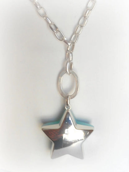 étoile bleue et argentée