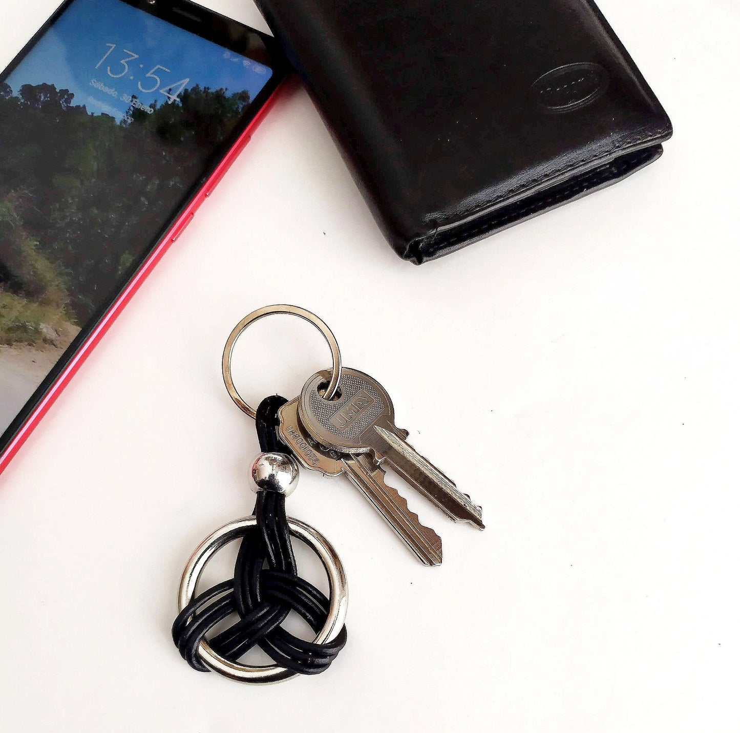 Leather and steel ratchet celtic symbol keychain