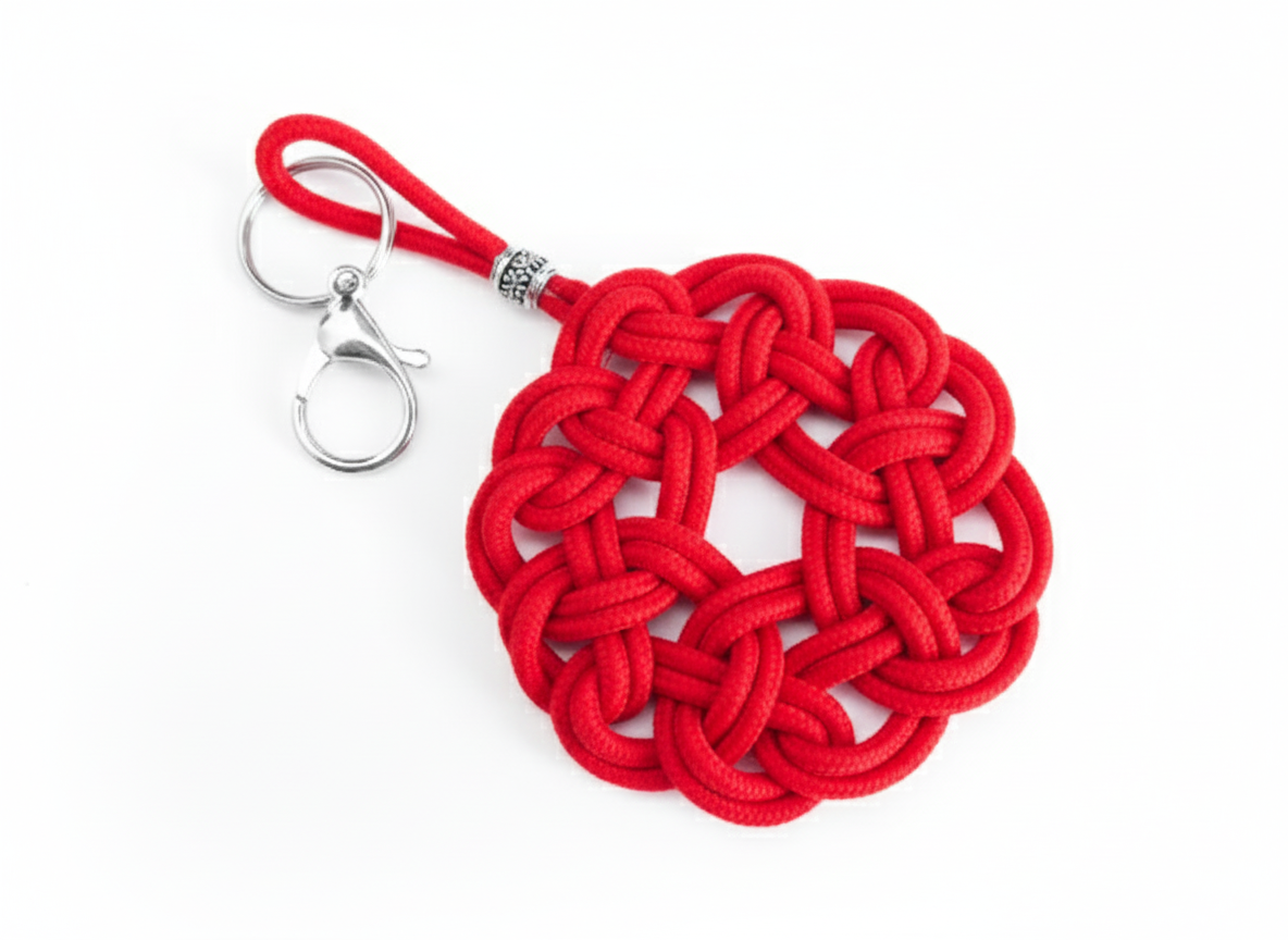 Porte-clés symbole celtique à cliquet en cuir et acier