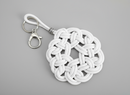 Porte-clés symbole celtique à cliquet en cuir et acier