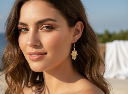 Golden earrings with Fatima's hand