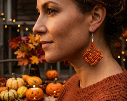 Leather and silver earrings with Irish Celtic knots.