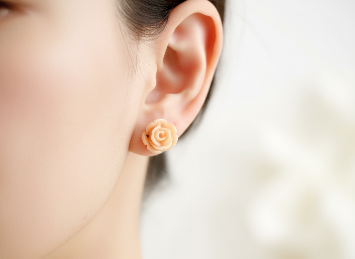 pendientes de botón con forma de delicadas rosas