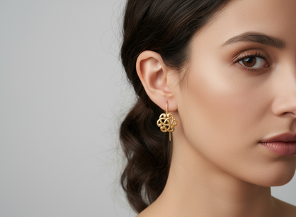 Gold earrings with Celtic triquetra symbol