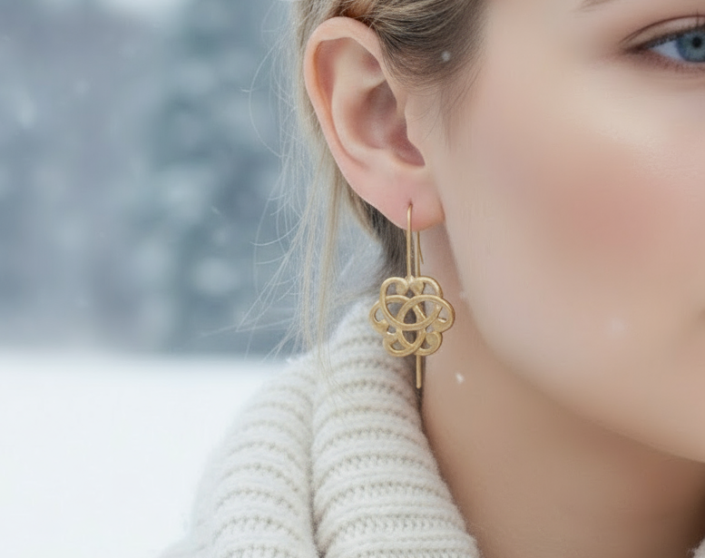 Gold earrings with Celtic triquetra symbol