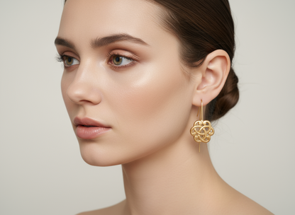 Gold earrings with Celtic triquetra symbol