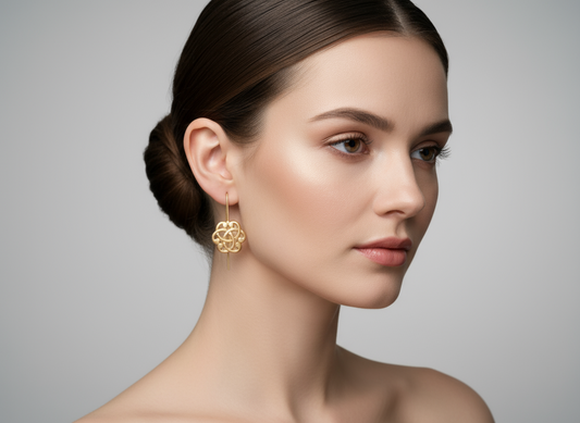 Pendientes dorados símbolo celta triqueta