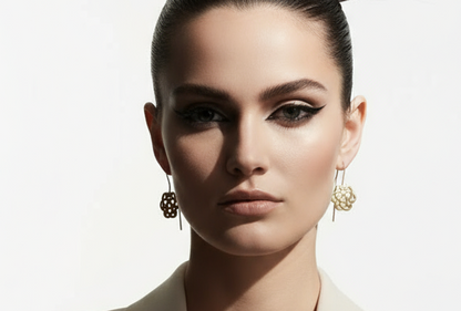 Gold earrings with Celtic triquetra symbol