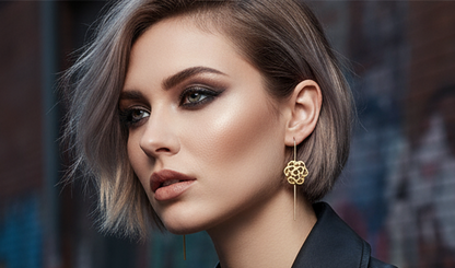 Gold earrings with Celtic triquetra symbol