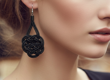 Leather and silver earrings with Celtic eternal love knot.
