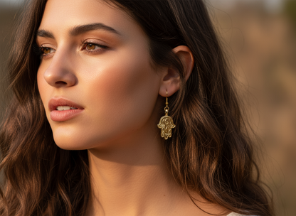 Golden earrings with Fatima's hand