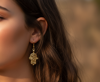 Golden earrings with Fatima's hand