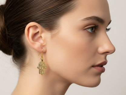 Golden earrings with Fatima's hand