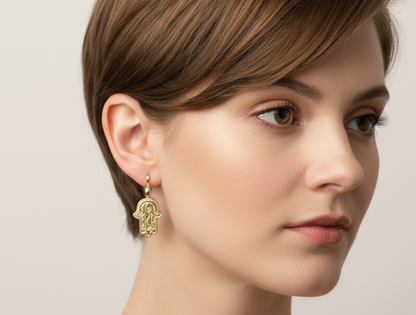 Golden earrings with Fatima's hand