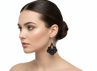 Leather and silver earrings with Irish Celtic knots.