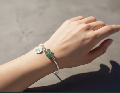 Bracelet tressé en cuir blanc et jade vert