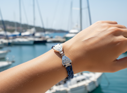 Braided sailor style bracelet in nautical blue with fish clasp