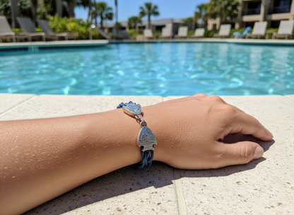 Braided sailor style bracelet in nautical blue with fish clasp