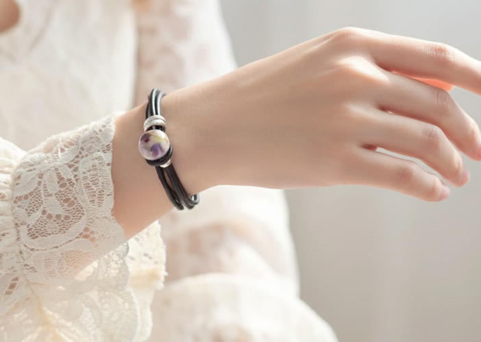 Bracelet double en cuir avec boule en céramique décorée