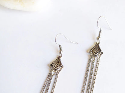 Long silver earrings Celtic style