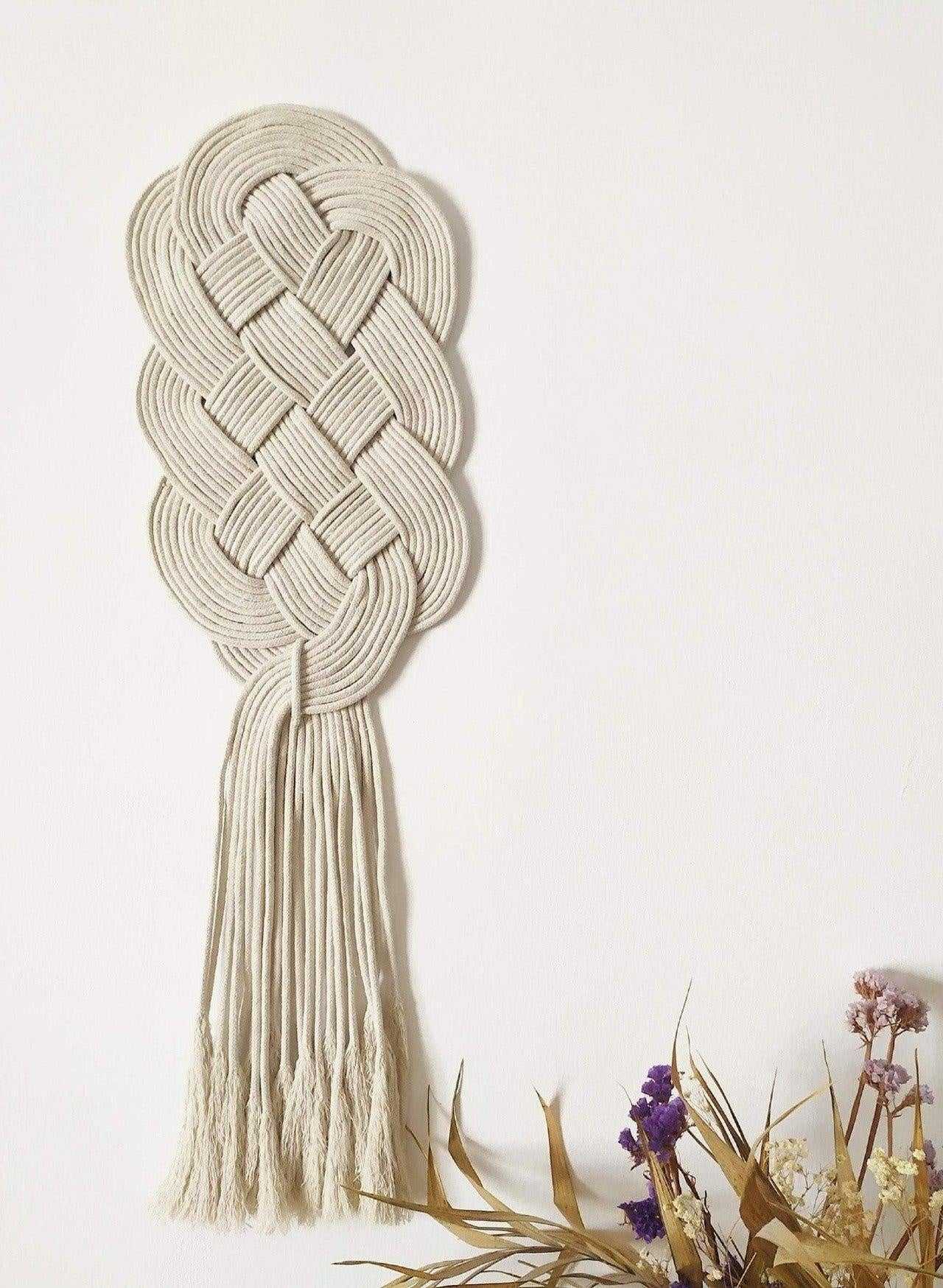 Macrame knotted tapestry for wall with Celtic knot protector of the home.